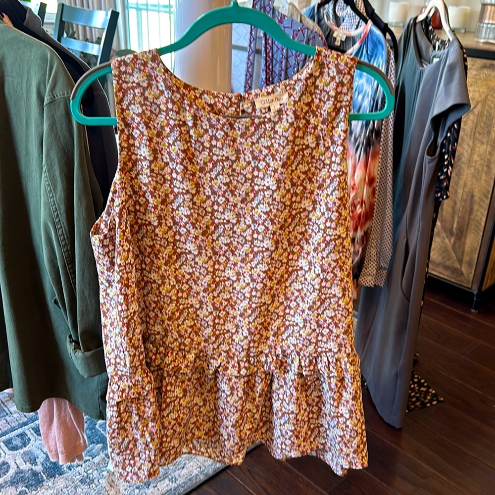 Fun, casual cotton top with summery flowers.